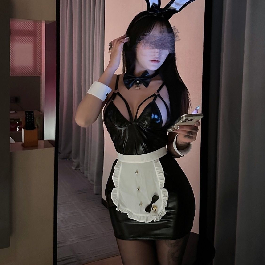 Front view of black leather bunny cosplay suit